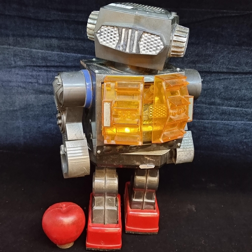 138 - A wonderful 1960s battery operated Japanese robot with articulated limbs and an opening chest plate.... 