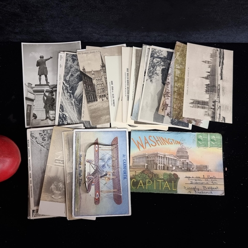 296 - A collection of approximately 36 vintage postcards including examples featuring historical landmarks... 