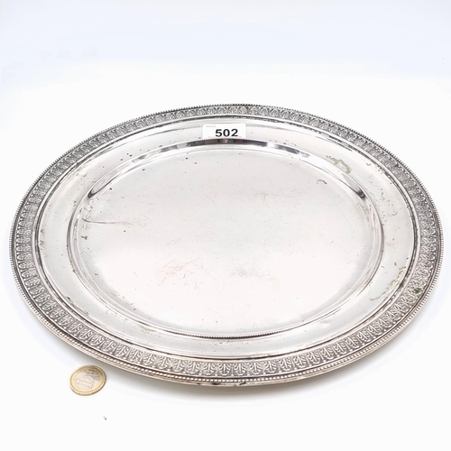 502 - Star lot : A very substantial large circular example of a Continental silver dish tray, set with fab... 