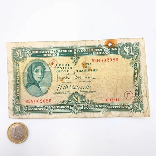 510 - Star lot : A rare Lady Lavery one pound note, which carries the encircled F indicating war zone code... 