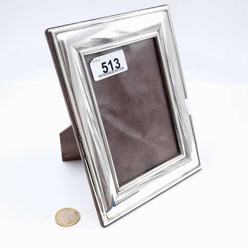 513 - A nice example of a glazed Carrs of Sheffield sterling silver photo frame. Internal measurements: 12... 