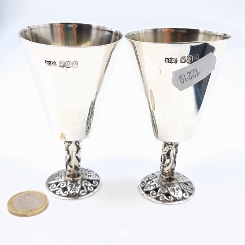 515 - Star Lot: A brilliant pair of high quality Irish silver goblets, these examples are excellently craf... 