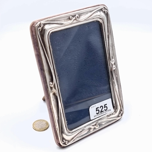 525 - A very attractive sterling silver glazed photo frame, featuring a pretty scroll motif. Hallmarked Lo... 