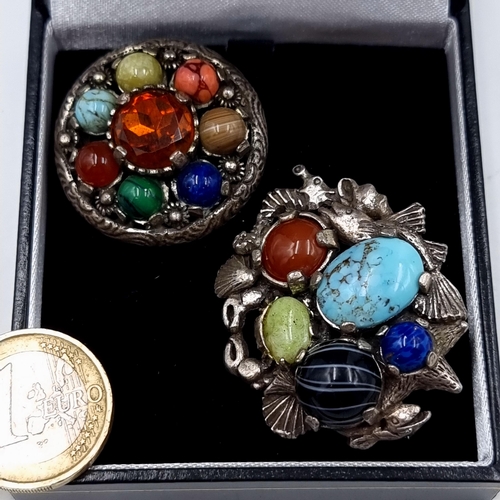 537 - A collection of two antique silver Scottish Amber and Agate stone brooches. Set with both pins intac... 