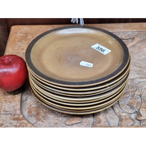 556 - Ten vintage Celtic Irish Fine Earthenware plates made in Limerick. In a two-tone brown finish.