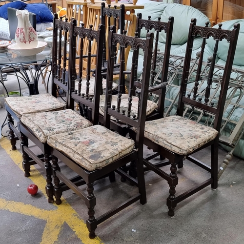 563 - A set of six wonderful high backed dining chairs with elaborate Gothic style carved detail to the ba... 