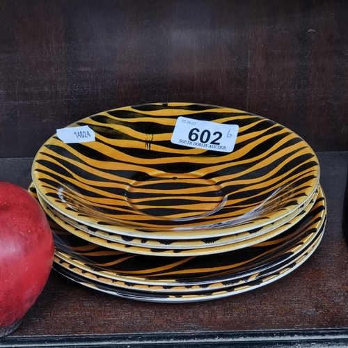 602 - Six pieces of John Ffrench Arklow Studio Pottery including three saucers and three side plates finis... 