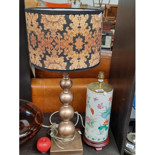 624 - Two table lamps including a hand painted Chinese example with cylindrical porcelain base, along with... 