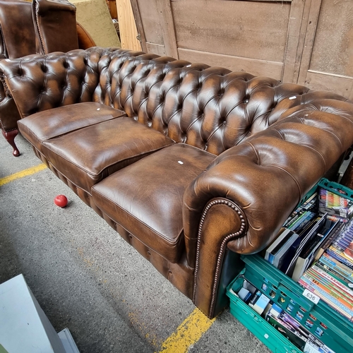 634 - Star lot : A handsome and very comfortable dark brown leather chesterfield 3 seater couch/sofa with ... 