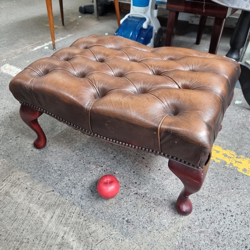 635 - Star lot : A smart Chesterfield footstool with cabriole wooden legs and brown leather diamond button... 