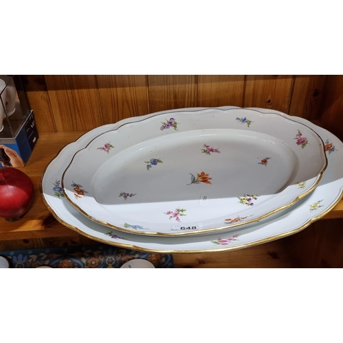 648 - Star lot : Two very fine large porcelain serving platters made by Meissen. With scalloped borders, p... 