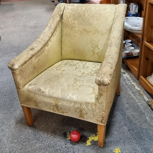 658 - A very elegant antique  bedroom chair with a sloped frame, wide seat and upholstered in a classic go... 