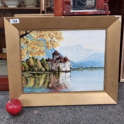 724 - A charming original vintage oil on canvas painting featuring a European castle by a still lake side.... 