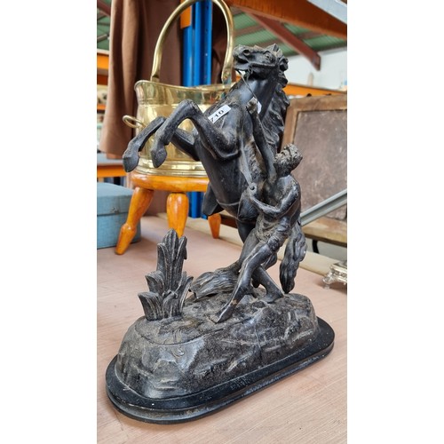 908 - A pair of very large 19th century heavy cast metal Marley horse figures. In a black finish. Slight d... 