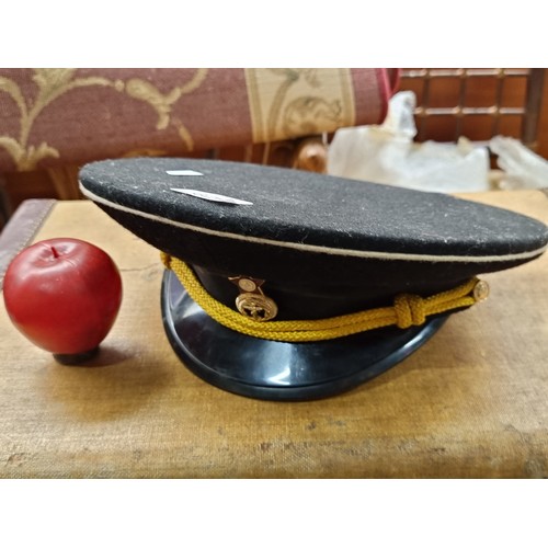 629 - A vintage  Soviet Russian navy admiral cap featuring a pin badge with the red star symbol and an anc... 