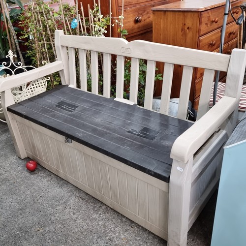 686 - A large three seater Keter eden garden bench with storage box underneath. In shades of beige and bro... 