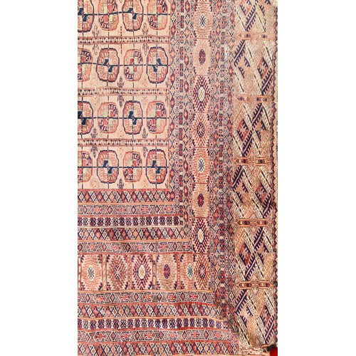 659 - Star lot : A spectacular vintage hand knotted rug boasting an intricate geometric pattern in vibrant... 