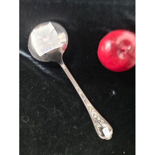 392 - A large European silver ladle with foliate ornament to handle. Marked Italy 800. Weight 139.9 grams.... 