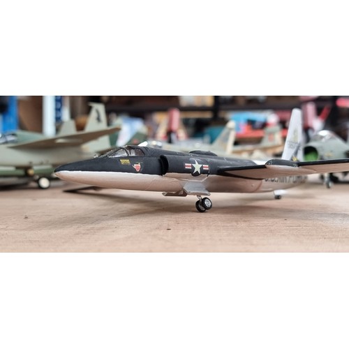 398 - Eleven military plastic model fighter airplanes including a Grumman F-14 Tomcat and a LTV A-7 Corsai... 