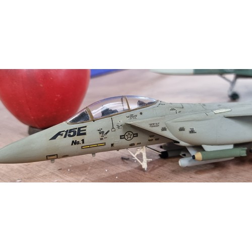 398 - Eleven military plastic model fighter airplanes including a Grumman F-14 Tomcat and a LTV A-7 Corsai... 