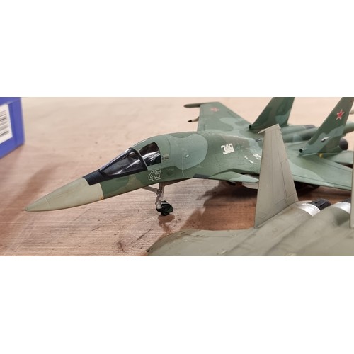 398 - Eleven military plastic model fighter airplanes including a Grumman F-14 Tomcat and a LTV A-7 Corsai... 