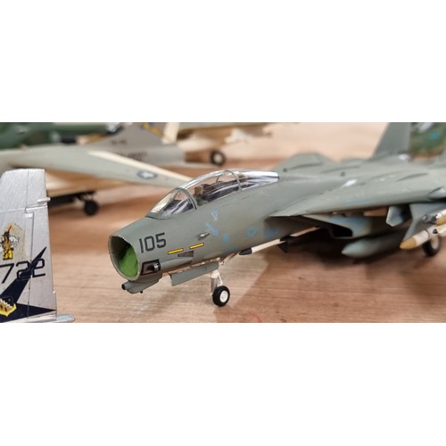 398 - Eleven military plastic model fighter airplanes including a Grumman F-14 Tomcat and a LTV A-7 Corsai... 