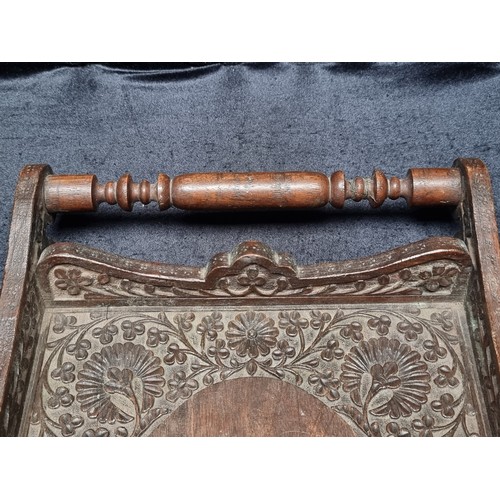 369 - Two antique wood items including a serving tray with elaborate ornament carved throughout. Along wit... 