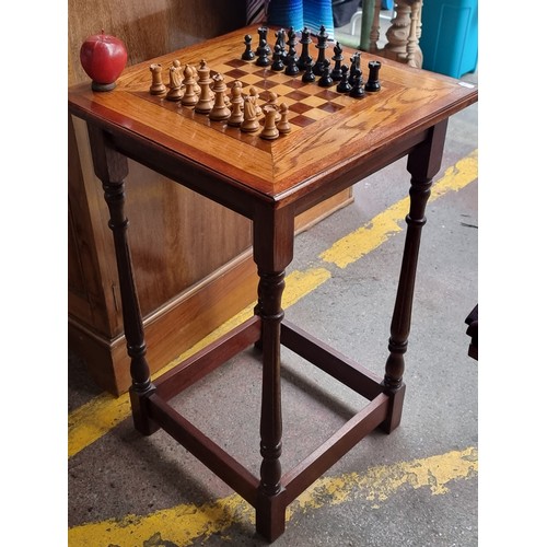 553 - Star Lot : A beautiful vintage chess table with a two-tone wooden top complete with an original set ... 