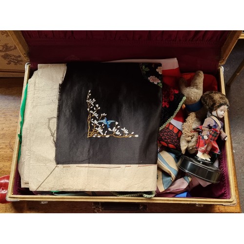 630 - A fantastic vintage Birkdale suitcase filled with a large variety of vintage textiles and fabrics in... 