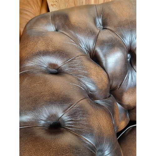 634 - Star lot : A handsome and very comfortable dark brown leather chesterfield 3 seater couch/sofa with ... 