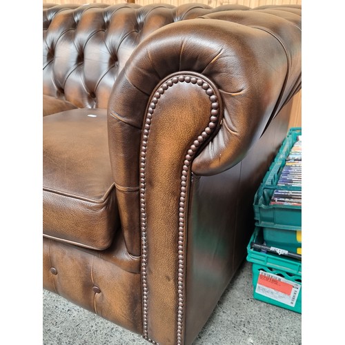 634 - Star lot : A handsome and very comfortable dark brown leather chesterfield 3 seater couch/sofa with ... 