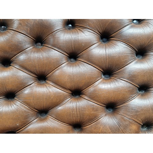 635 - Star lot : A smart Chesterfield footstool with cabriole wooden legs and brown leather diamond button... 