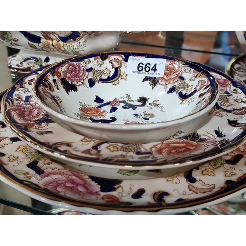 664 - Star lot : A very impressive thirty-four piece dinner service by Mason's Ironstone in their iconic 