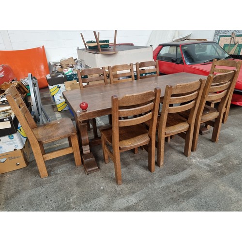 703 - Star lot : An incredibly heavy and beautifully crafted oakwood dining suite. Consisting of a solid o... 