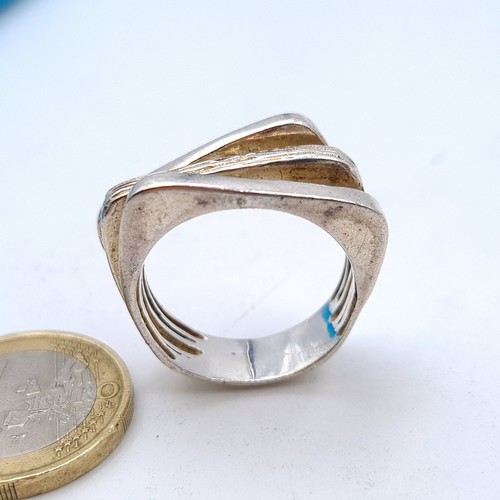 508 - A heavy Russian silver gent's three strand channel ring. Ring size: T. Weight: 8.54 grams.