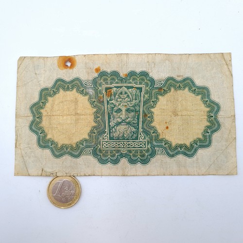 510 - Star lot : A rare Lady Lavery one pound note, which carries the encircled F indicating war zone code... 