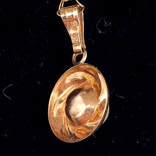 519 - A 9 carat gold drop pearl pendant necklace, set with a 9 carat gold chain. Length of chain: 46cm. To... 