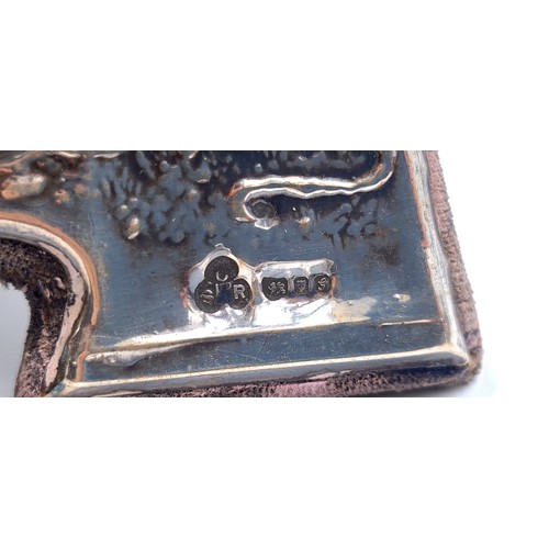 523 - A fine example of a sterling silver glazed photo frame, set with a Grecian grape and vine and figure... 