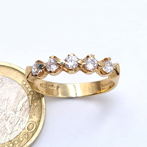 543 - A mesmerising 9 carat gold five stone Moissanite ring, set nicely on a wide band and showing import ... 