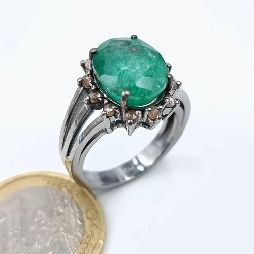 4 - Star Lot : A fabulous example of a Emerald and Diamond sterling silver ring, set beautifully with a ... 
