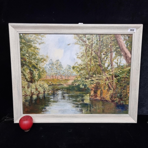 68 - A lovely original oil on canvas painting featuring a view down a river lined with thick luscious fol... 