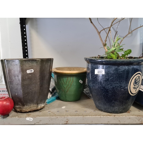 887 - Three delightful ceramic outdoor planters including one in a royal blue glaze with rose vignette, a ... 