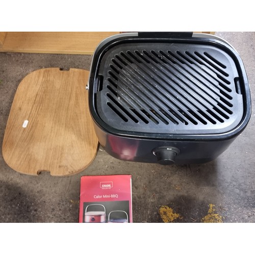 898 - A Calor Mini-BBQ with a removable tier, an adjustable heat setting, a wooden chopping board lid, 400... 