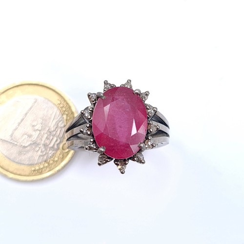 11 - Star lot : A truly beautiful example of a very large 7.20 carat Ruby and Diamond ring, set in sterli... 