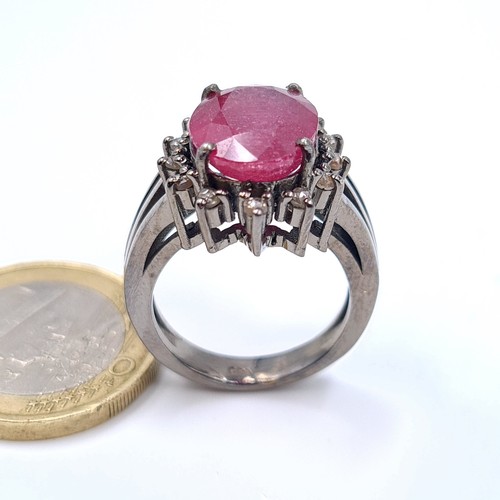 11 - Star lot : A truly beautiful example of a very large 7.20 carat Ruby and Diamond ring, set in sterli... 