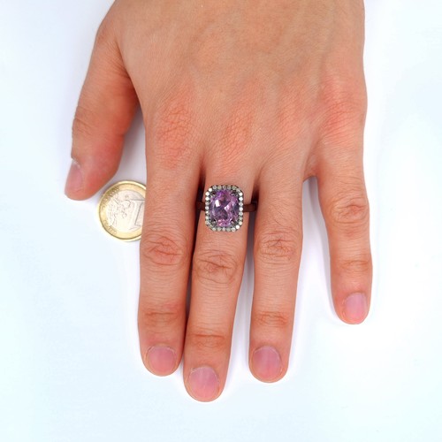 18 - Star Lot : A mesmerising Purple Ametrine and Diamond ring, set beautifully with a Diamond surround o... 