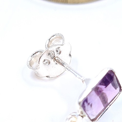 20 - A fabulous pair of Amethyst and Lemon Topaz drop earrings, set in sterling silver a featuring excell... 