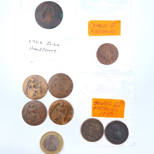 44 - A very interesting collection, consisting of a Charles II farthing, a 1766 Irish half penny and a 17... 