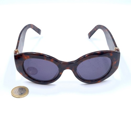 47 - A pair of designer Marc Jacobs sunglasses, set with Faux Tortoiseshell frames. and featuring a styli... 