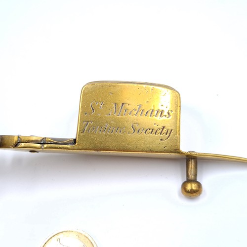 52 - An interesting collection of two 19th century candle snuffers, featuring a brass example with the in... 